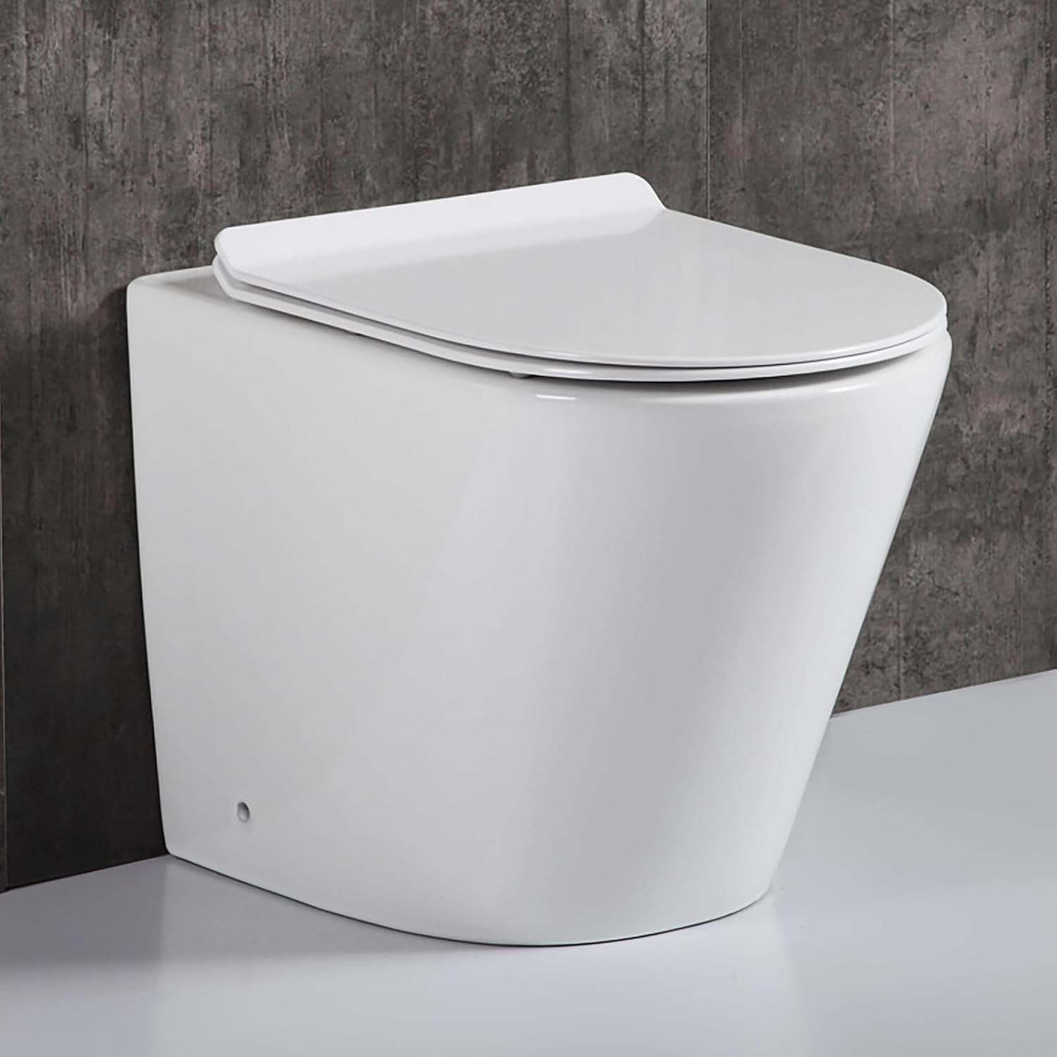 Robanmoa Rimless BTW Back to Wall Toilet White Ceramic WC Pan Quick Release Soft Close Seat in-Wall Concealed Cistern Short Projection Pan Modern Compact Bathroom Toilets.