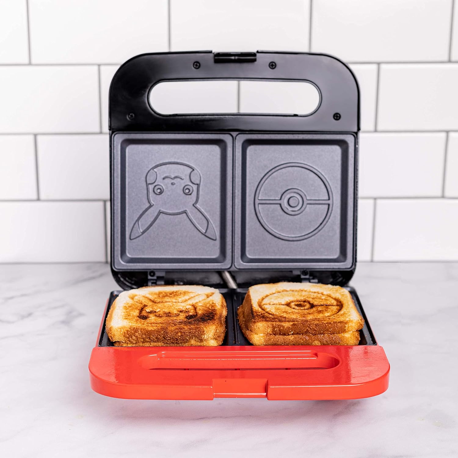 Uncanny Brands Pokemon Grilled Cheese Maker - Make Pokeball and Pikachu Sandwiches - Kitchen Appliance - UK Plug - Amazing Gadgets Outlet